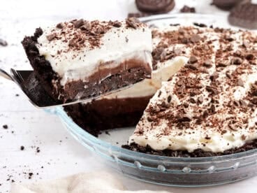 Side view of a Mississippi Mud Pie with a slice being taken.