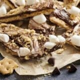 S'mores bark on a piece of parchment paper.