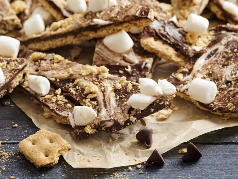 S'mores bark on a piece of parchment paper.