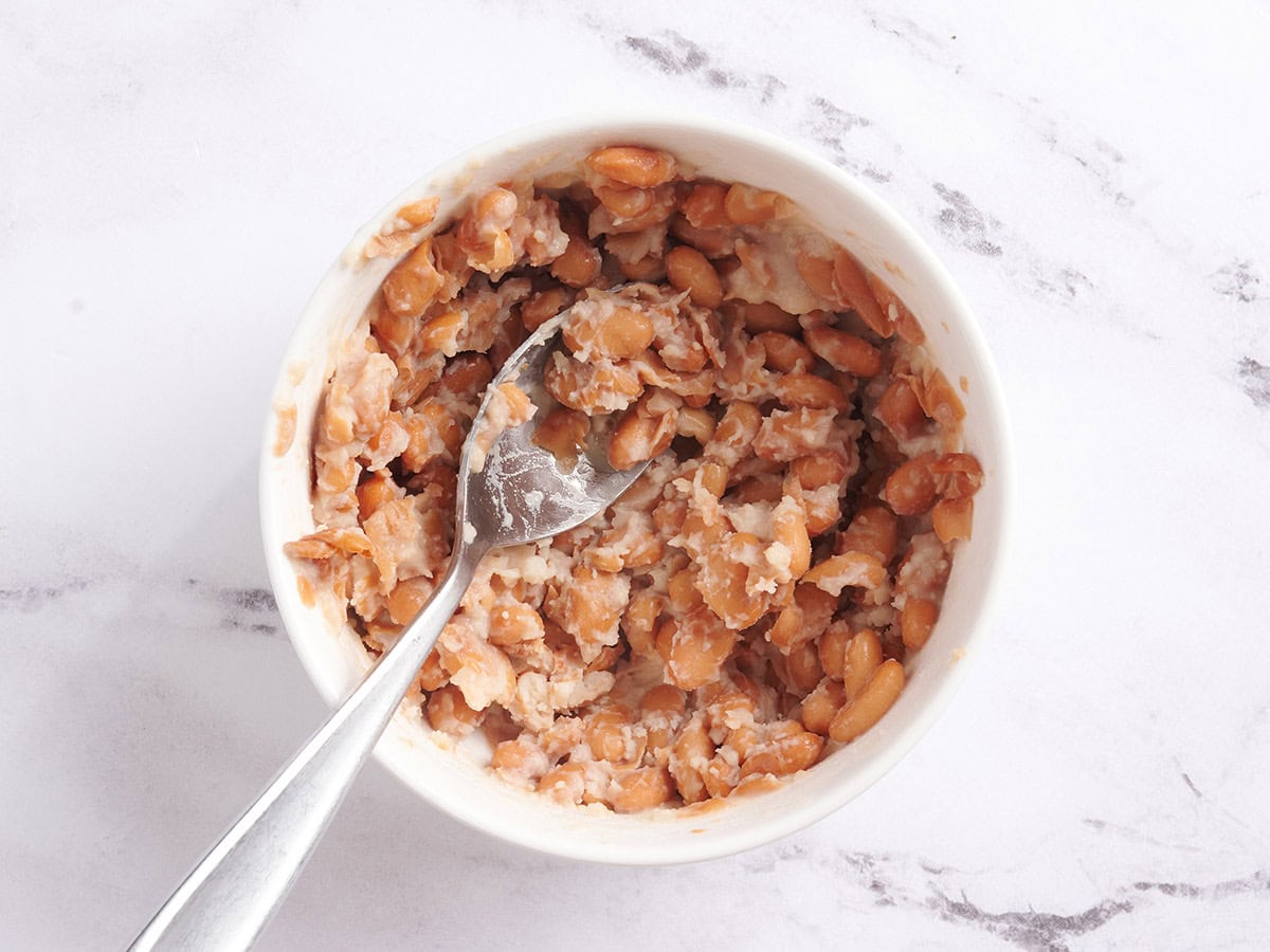 Mashed beans in a bowl.