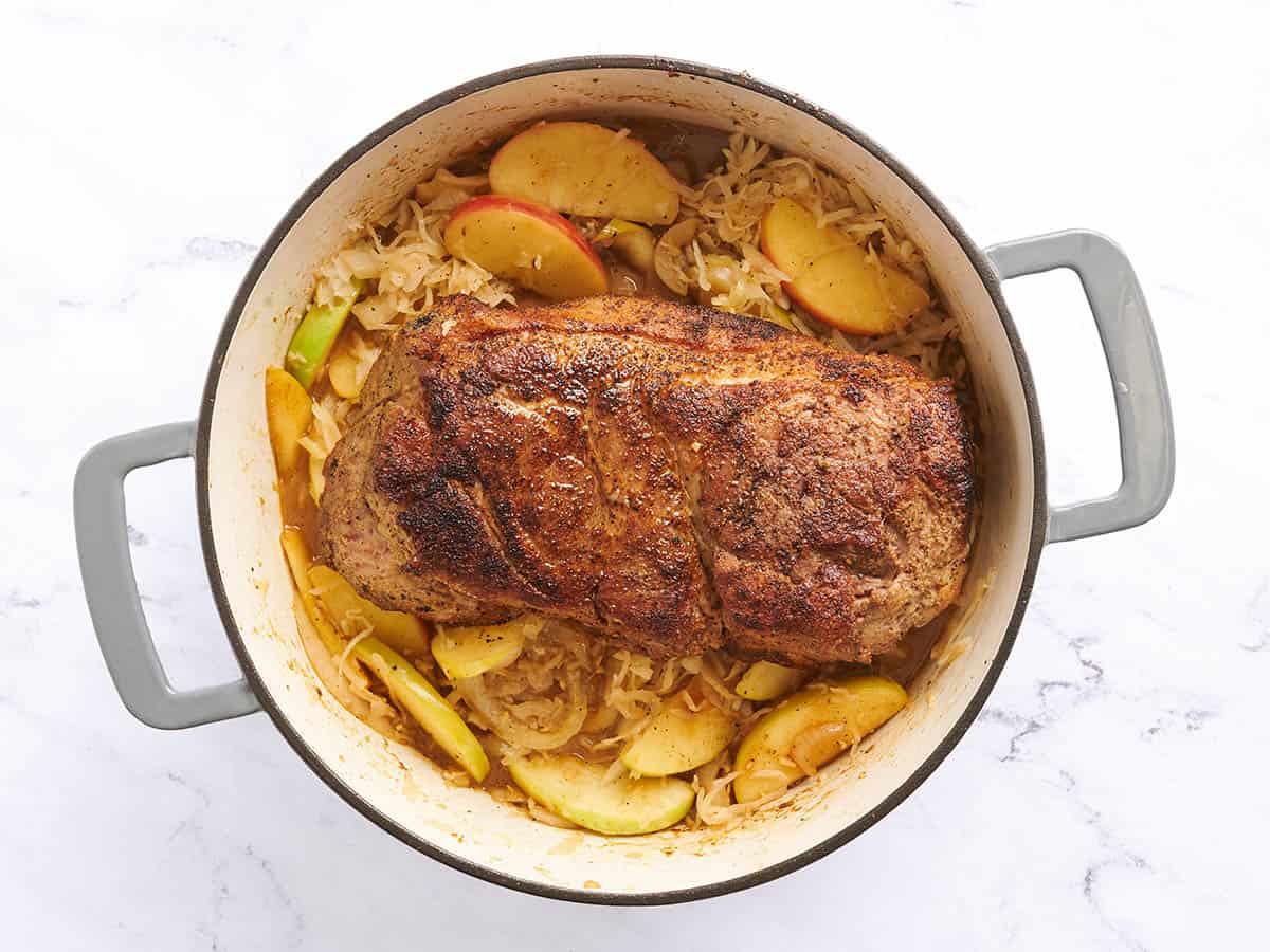 Pork and sauerkraut in a dutch oven.