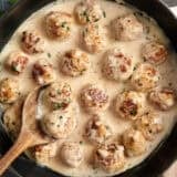 chicken meatballs in cream sauce in skillet