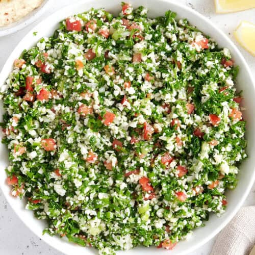 Overhead view of a bowl of fresh cauliflower tabbouleh.