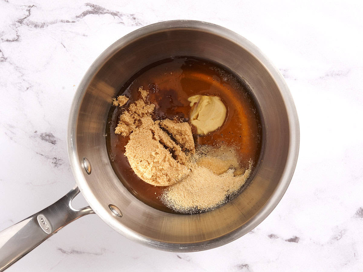 Honey glaze ingredients in a sauce pan.