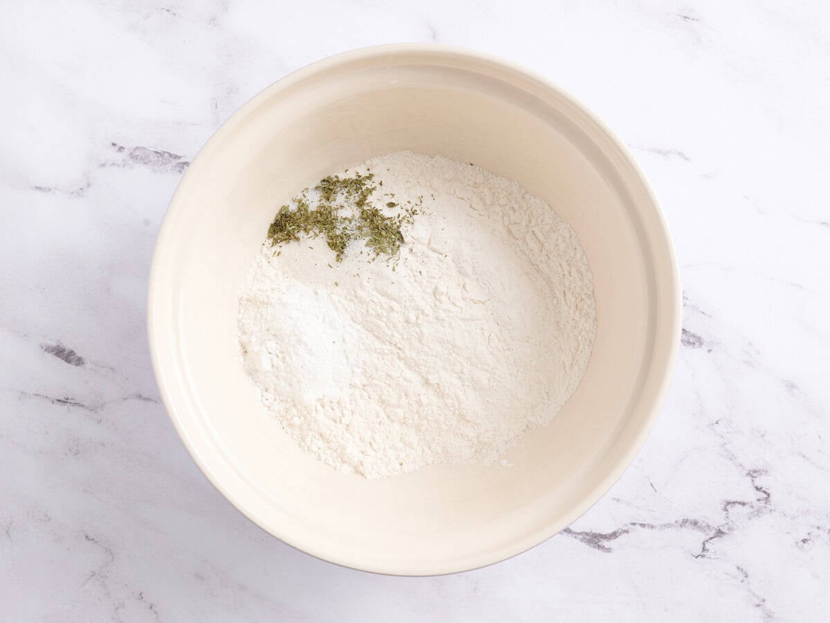 Seasonings and flour in a bowl.