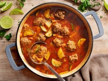 Overhead view of a pot of Mexican meatball soup (Albondigas)