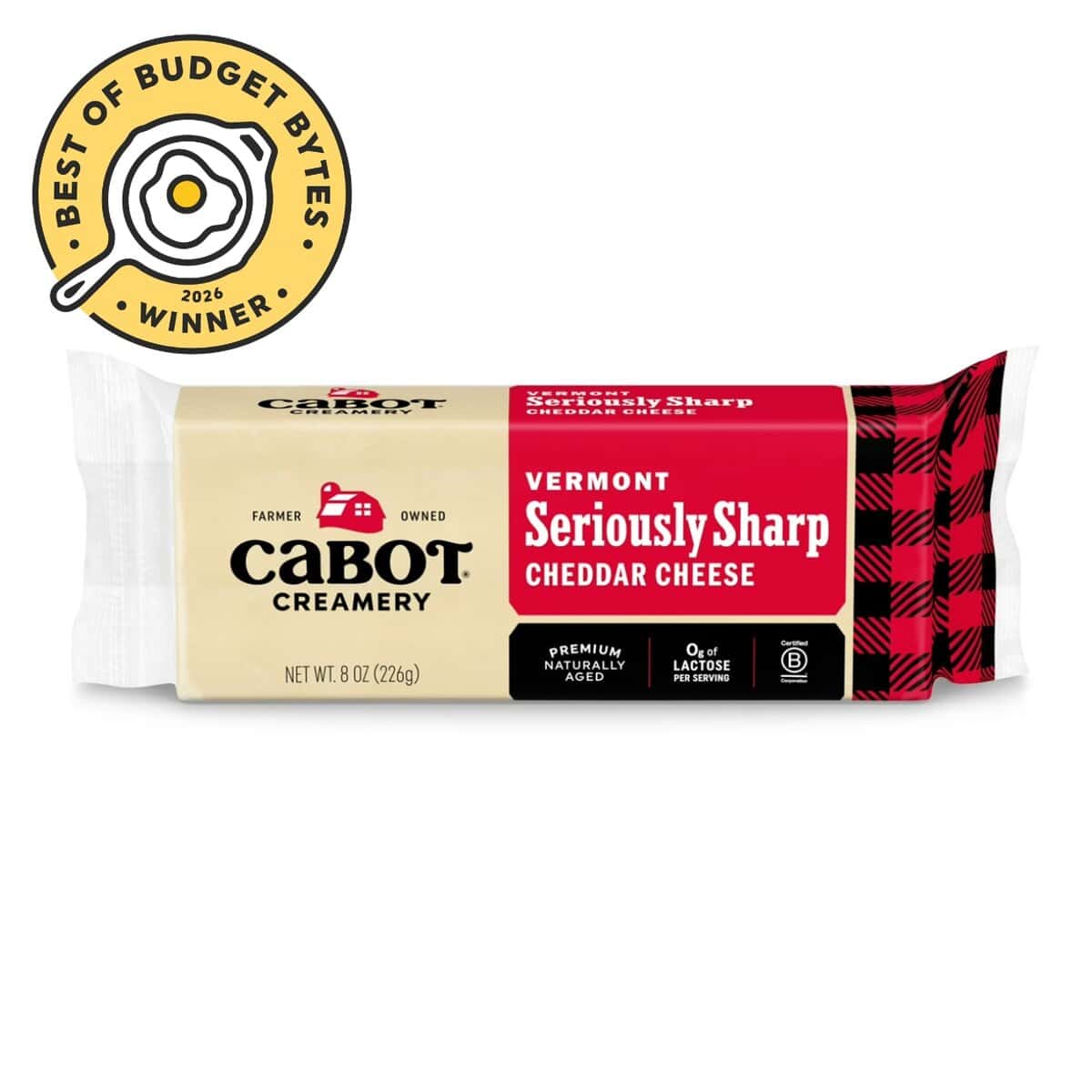 front view of a block of cabot cheese with a budget bytes seal.