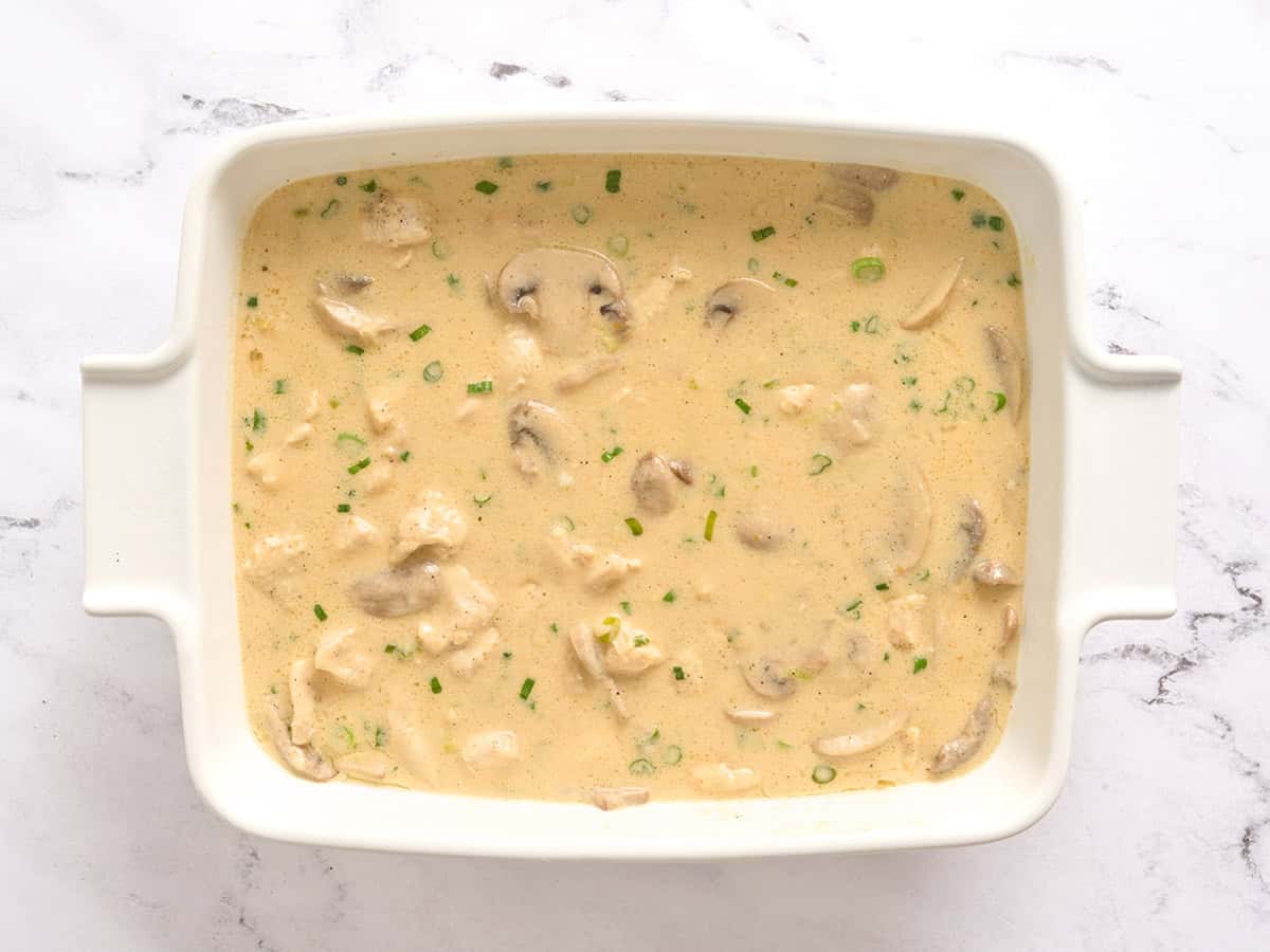 A million dollar chicken casserole in a casserole dish without topping.