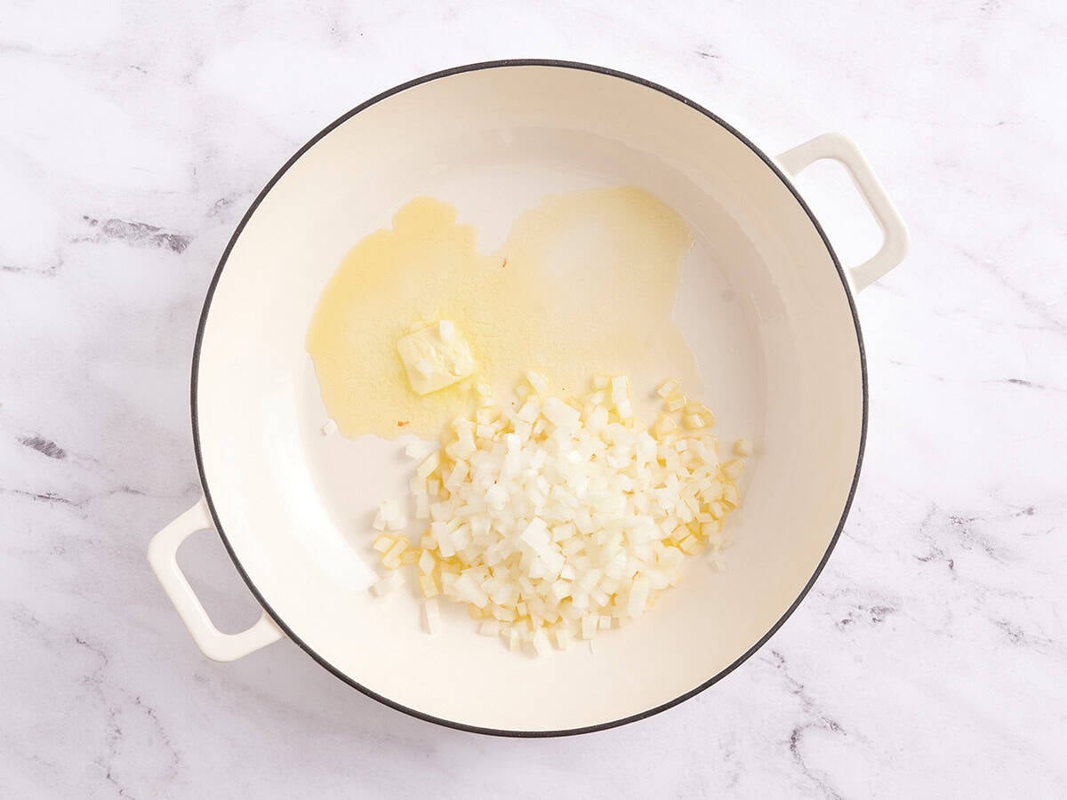 Butter, oil and onions in a skillet.