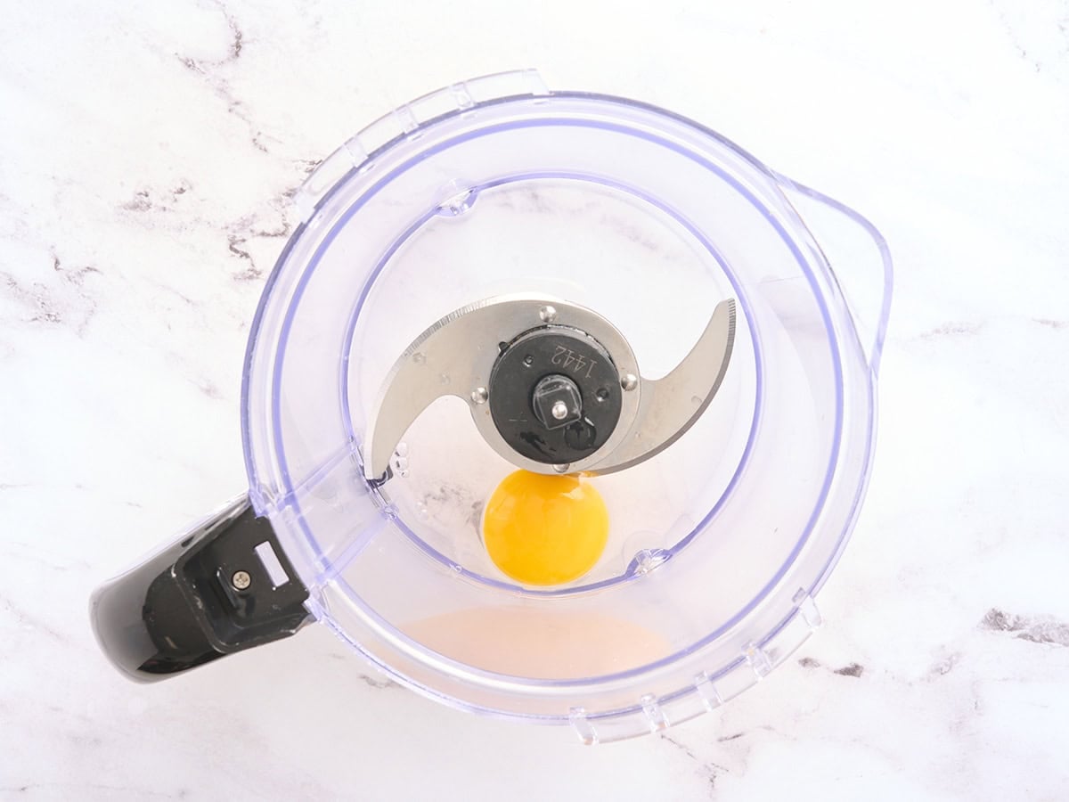An egg in a food processor.