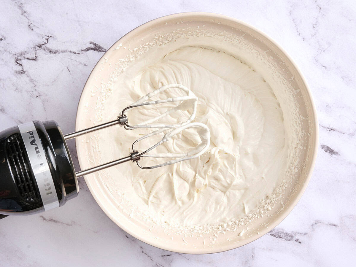Whipped cream in a bowl.