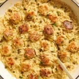 Overhead view of a chicken piccata meatball and orzo skillet.