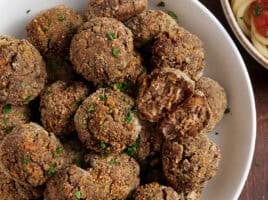 Overhead view of a plate of vegan meatballs.