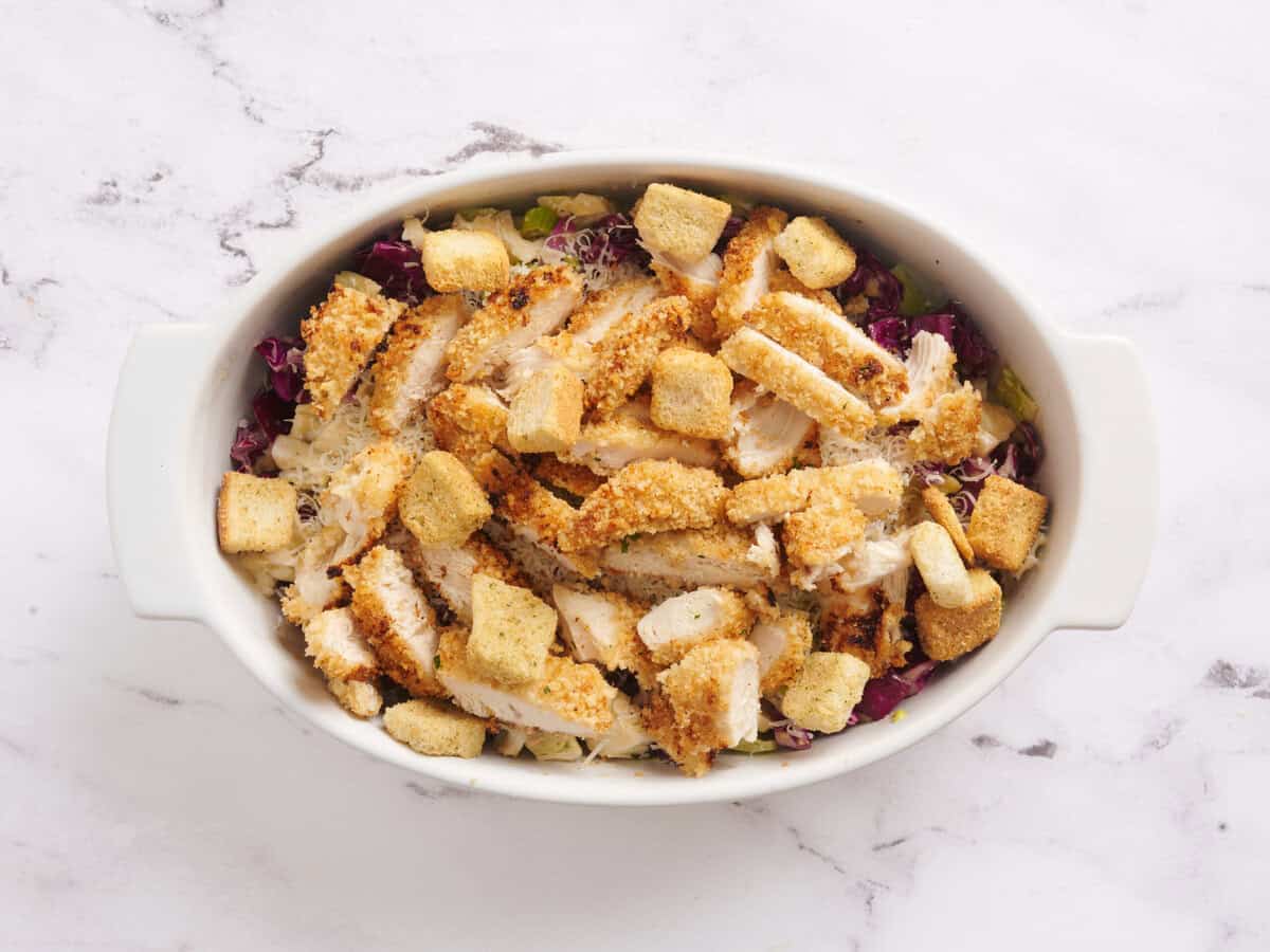 Chopped chicken tenders added to Caesar slaw.