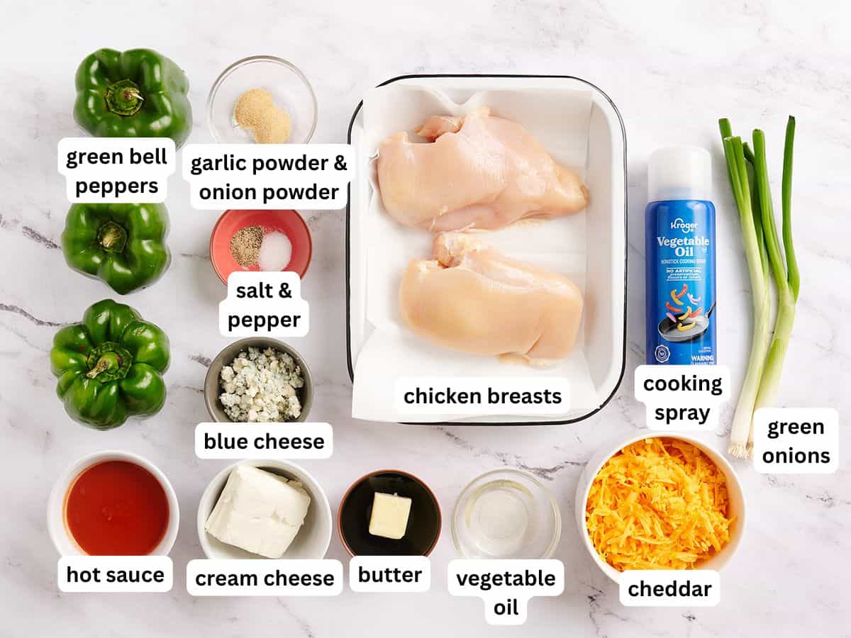 The ingredients to make buffalo chicken stuffed peppers with labels.