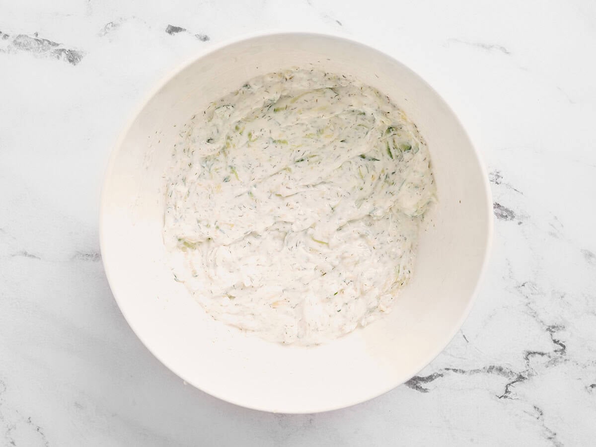 Finished tzatziki sauce in a bowl.
