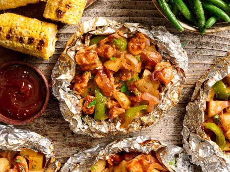 Overhead view of a BBQ chicken foil packet.