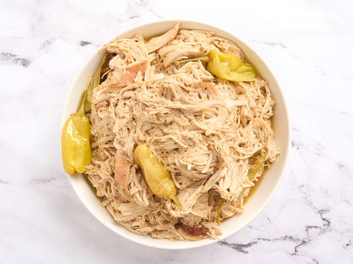 Shredded Mississippi chicken in a bowl.