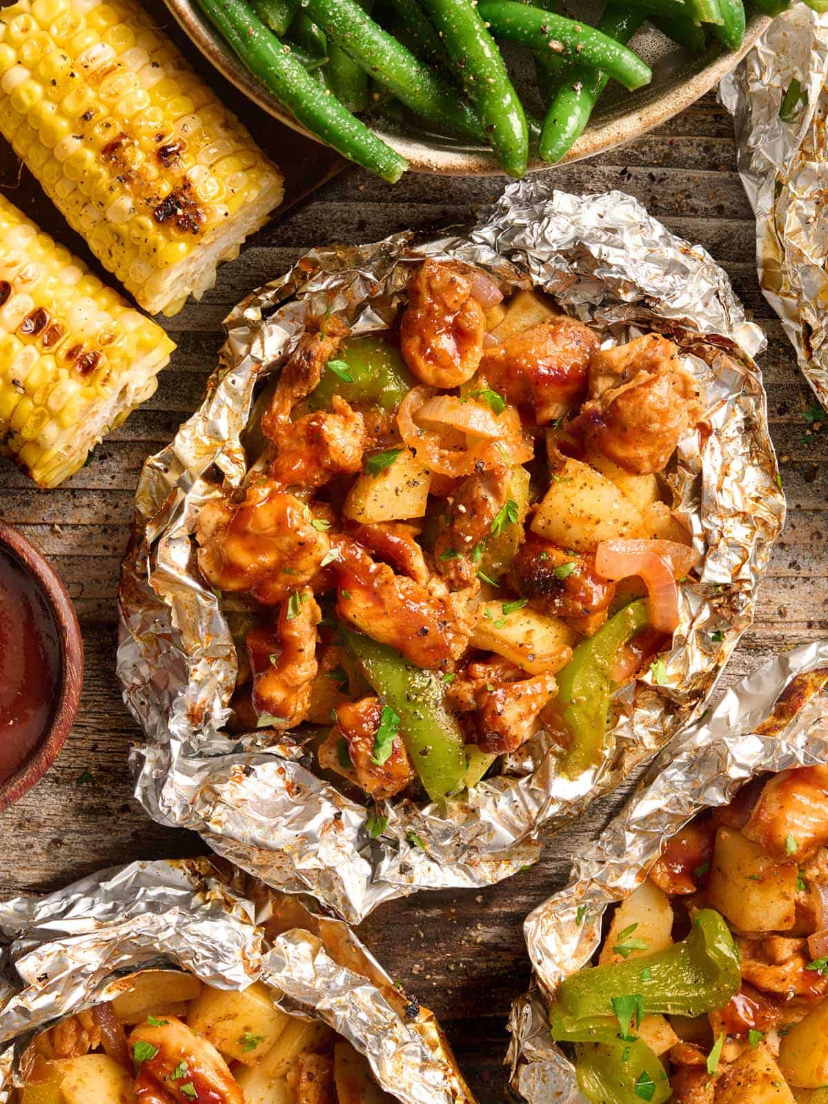 Overhead view of a BBQ chicken foil packet.