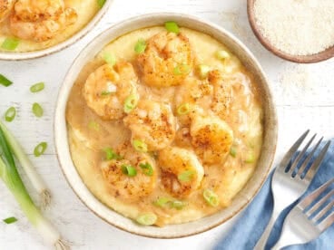 Overhead view of a bowl of shrimp and grits.