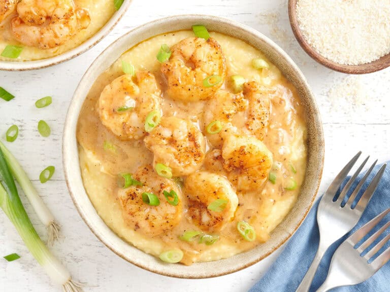 Overhead view of a bowl of shrimp and grits.