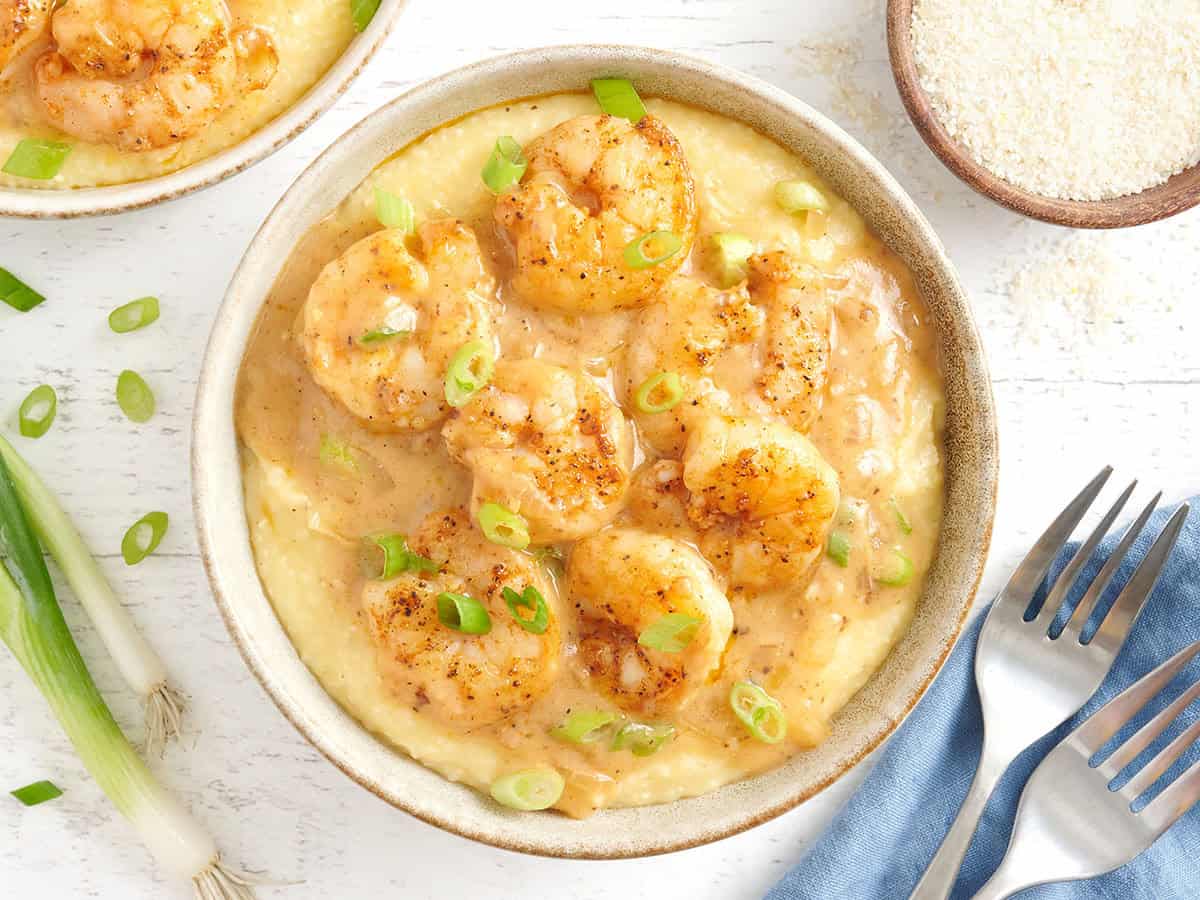 Overhead view of a bowl of shrimp and grits.