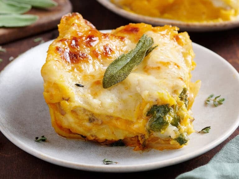 Side view of a slice of butternut squash lasagna.